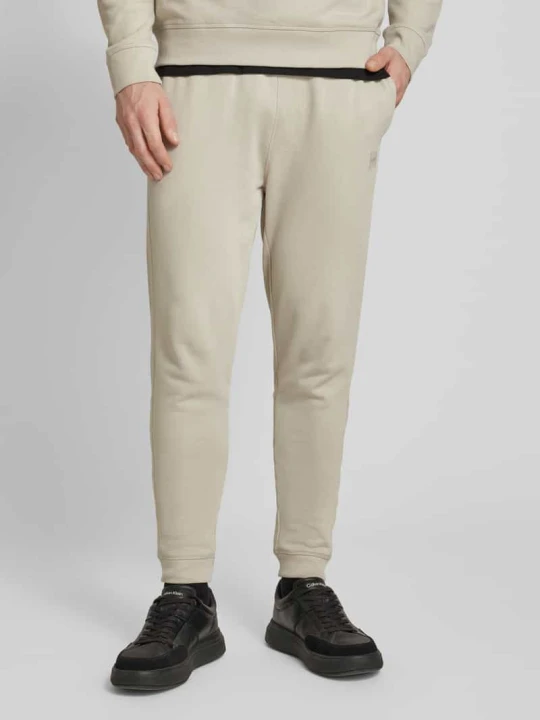Zdjęcie produktu Spodnie dresowe o kroju slim fit z elastycznym pasem Boss Beżowy