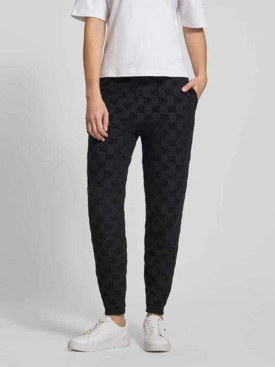 Zdjęcie produktu Spodnie dresowe o kroju slim fit z mieszanki bawełny model „TERRYMONOGRAM” Hugo Czarny