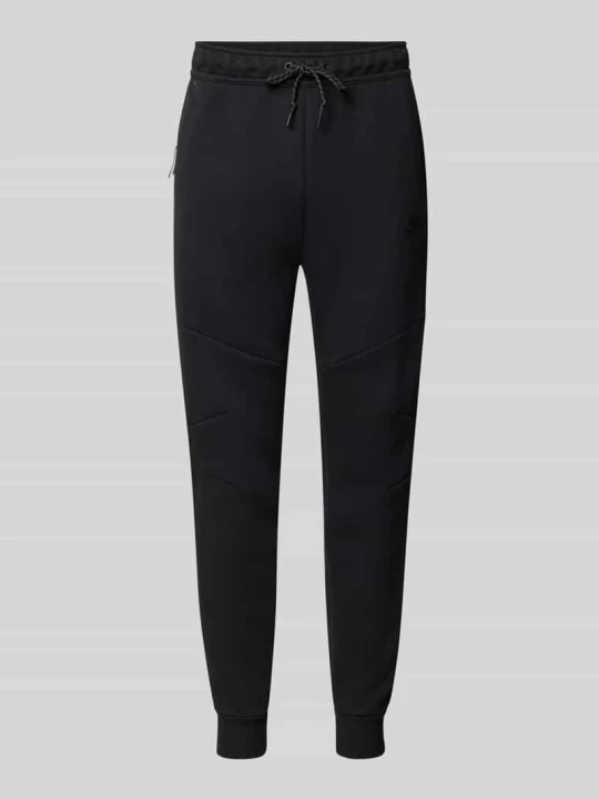 Zdjęcie produktu Spodnie dresowe o kroju slim fit z mieszanki bawełny Nike Czarny