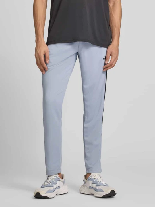 Zdjęcie produktu Spodnie dresowe o kroju slim fit z nadrukiem z logo Adidas Średnioszary