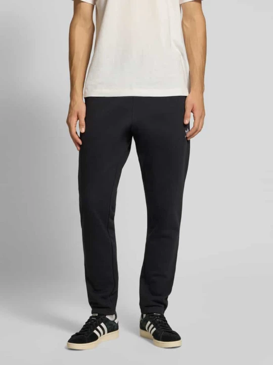 Zdjęcie produktu Spodnie dresowe o kroju slim fit z wyhaftowanym logo adidas Originals Czarny