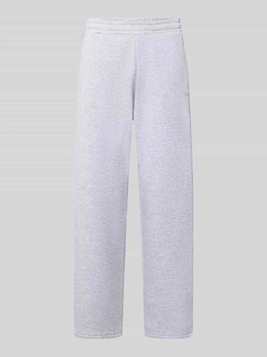 Zdjęcie produktu Spodnie dresowe o kroju straight fit z detalem z logo REVIEW Jasnoszary melanż