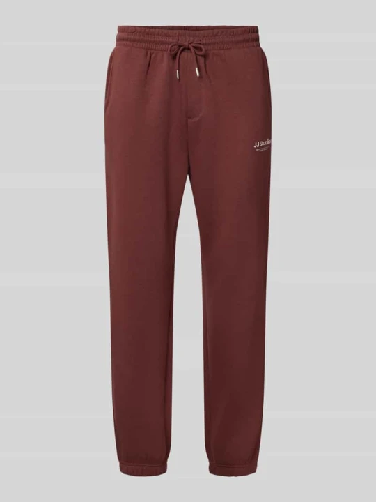 Zdjęcie produktu Spodnie dresowe o kroju straight fit z mieszanki bawełny model 'Kane' Jack&Jones Bordowy