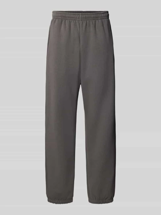 Zdjęcie produktu Spodnie dresowe o kroju straight fit z mieszanki bawełny z wpuszczanymi kieszeniami Urban Classics Antracytowy