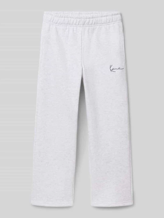 Zdjęcie produktu Spodnie dresowe o kroju straight fit z nadrukiem z logo Karl Kani Średnioszary melanż