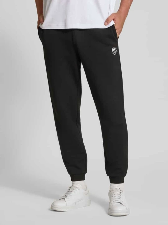 Zdjęcie produktu Spodnie dresowe o kroju tapered z czystej bawełny Lacoste Czarny