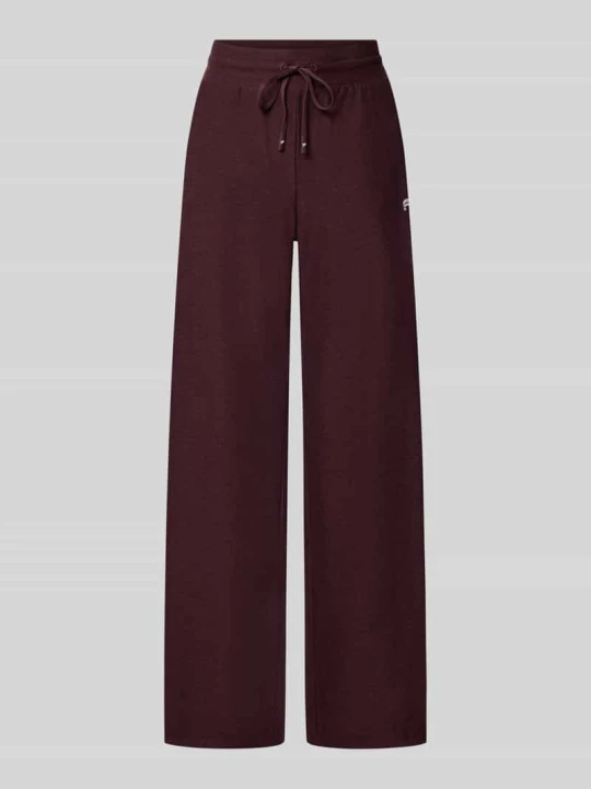 Zdjęcie produktu Spodnie dresowe o kroju wide fit z detalem z logo model 'CLOUD' Fabletics Bordowy
