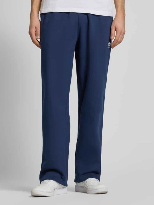 Zdjęcie produktu Spodnie dresowe o kroju wide fit z elastycznym pasem adidas Originals Granatowy