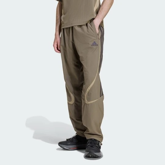 Zdjęcie produktu SPODNIE DRESOWE Teamgeist Adicolor Adidas Blanch Brown