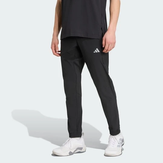 Zdjęcie produktu Spodnie dresowe Tech Apparel Adidas czarny