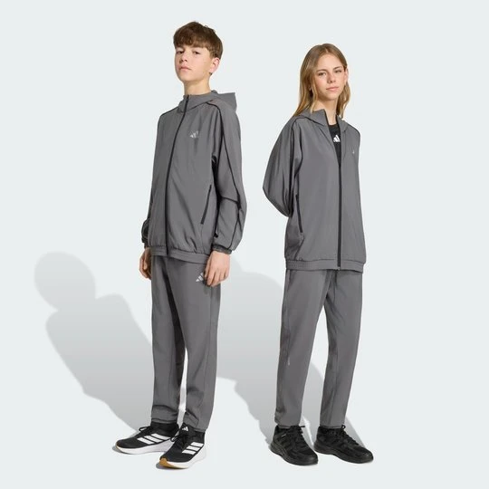 Zdjęcie produktu SPODNIE DRESOWE TECH APPAREL Adidas szary
