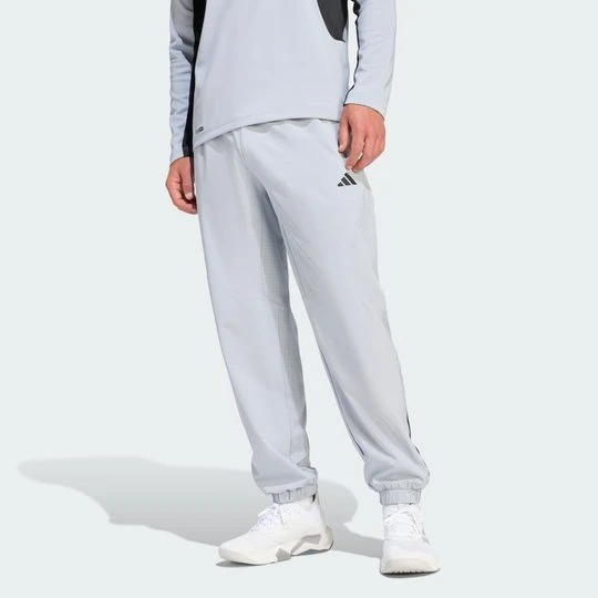 Zdjęcie produktu SPODNIE DRESOWE TECH ESSENTIALS WORKOUT Adidas Halo Silver
