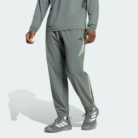 Zdjęcie produktu SPODNIE DRESOWE TECH ESSENTIALS WORKOUT Adidas Legend Ivy