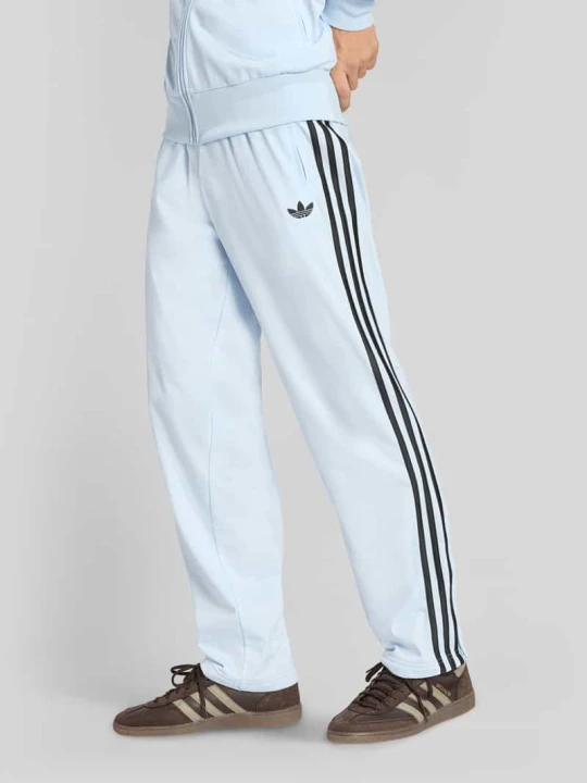 Zdjęcie produktu Spodnie dresowe w kroju regular fit model 'FIREBIRD' adidas Originals Jasnoniebieski