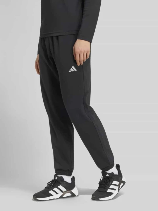 Zdjęcie produktu Spodnie dresowe w kroju regular fit z dodatkiem lyocellu Adidas Czarny
