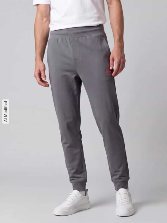 Zdjęcie produktu Spodnie dresowe w kroju regular fit z mieszanki bawełny model 'Laze Pants CW' Hugo Średnioszary