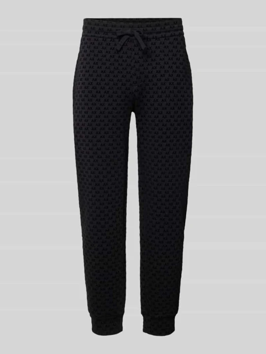 Zdjęcie produktu spodnie dresowe we wzór na całej powierzchni z wzór z logo model 'PANTALONI' Armani Exchange Czarny