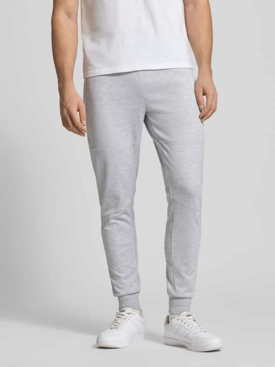 Zdjęcie produktu Spodnie dresowe z Bawełna Model 'GORDON' Jack&Jones Jasnoszary melanż