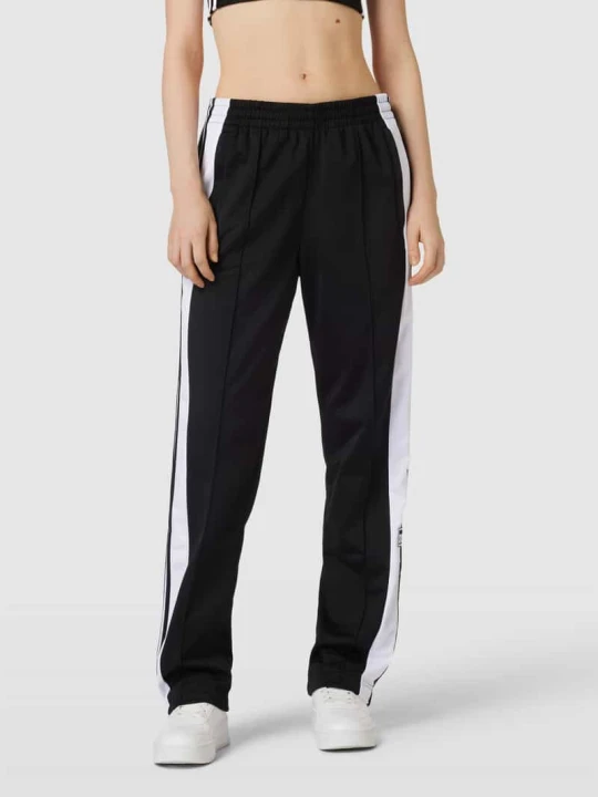 Zdjęcie produktu Spodnie dresowe z bocznymi listwami na zatrzaski model ‘ADIBREAK’ adidas Originals Czarny