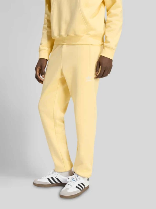 Zdjęcie produktu Spodnie dresowe z czystej bawełny adidas Originals Jasnożółty