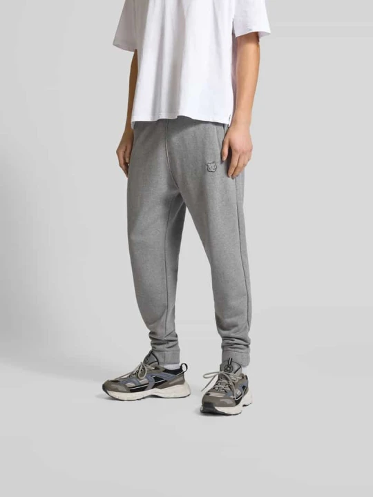 Zdjęcie produktu Spodnie dresowe z czystej bawełny Maison Kitsuné Średnioszary melanż