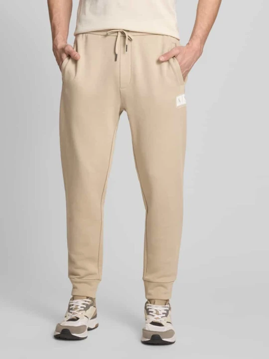 Zdjęcie produktu Spodnie dresowe z czystej bawełny w kroju regular fit Armani Exchange Piaskowy