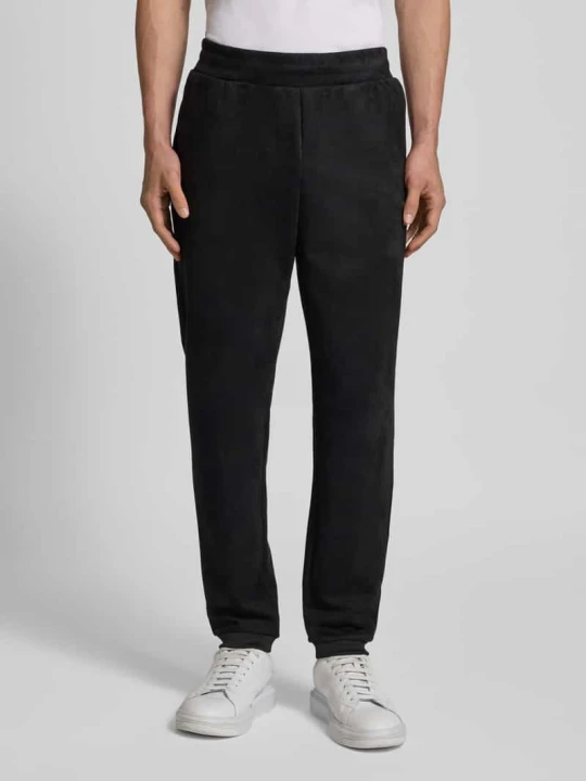 Zdjęcie produktu Spodnie dresowe z detalem z logo EA7 Emporio Armani Czarny
