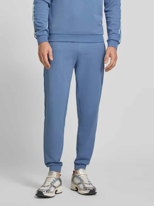Zdjęcie produktu Spodnie dresowe z elastycznym pasem EA7 Emporio Armani Błękitno-niebieski