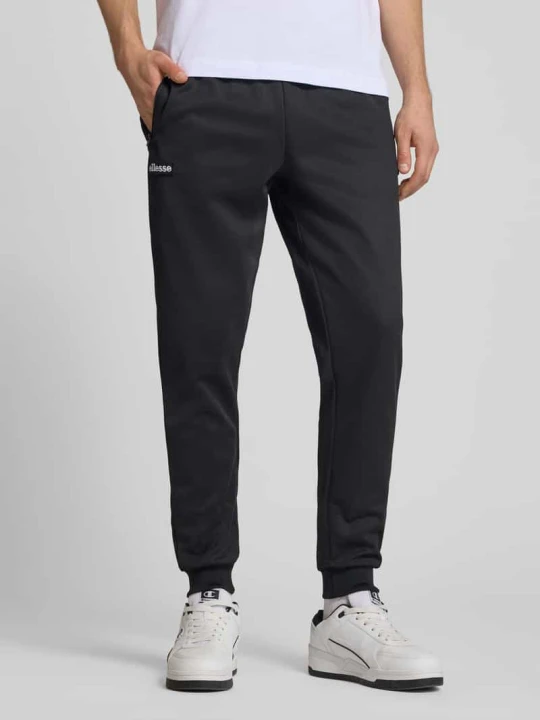 Zdjęcie produktu Spodnie dresowe z elastycznym pasem model 'BERTONI' Ellesse Czarny