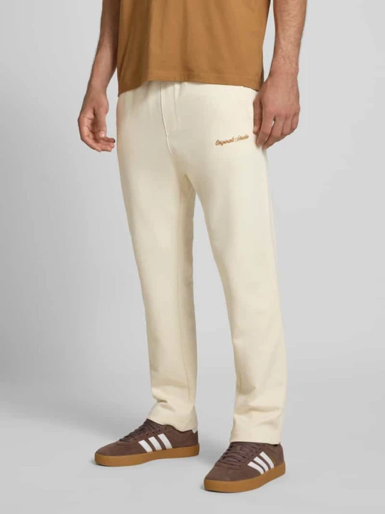 Zdjęcie produktu Spodnie dresowe z elastycznym pasem model ‘KANE’ Jack&Jones Złamany biały