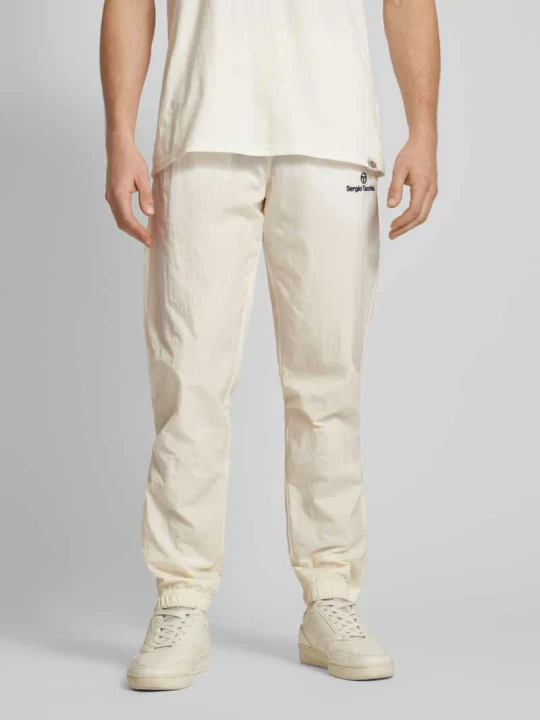Zdjęcie produktu Spodnie dresowe z elastycznym pasem model ‘NAYLA’ Sergio Tacchini Złamany biały