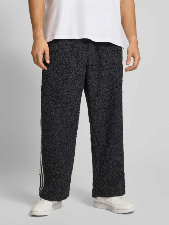 Zdjęcie produktu Spodnie dresowe z elastycznym ściągaczem adidas Originals Czarny