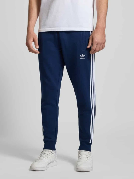 Zdjęcie produktu Spodnie dresowe z elastycznym ściągaczem adidas Originals Granatowy