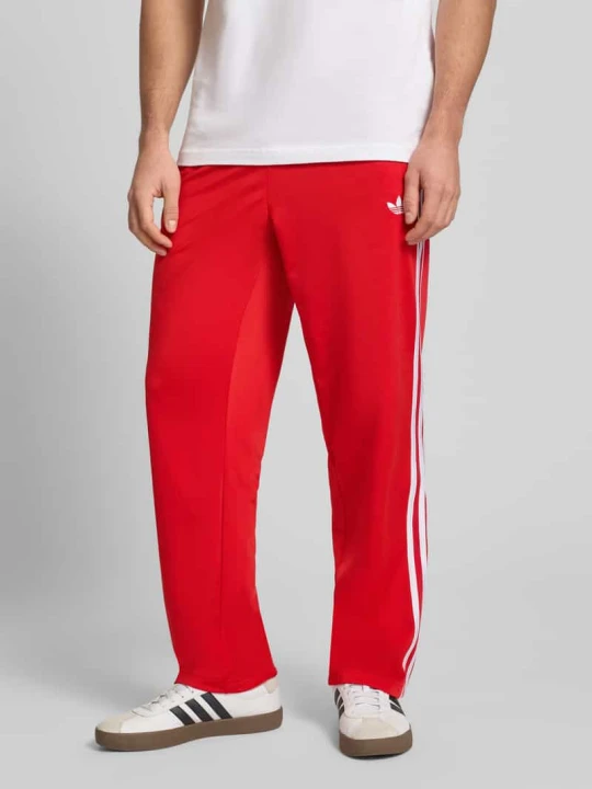 Zdjęcie produktu Spodnie dresowe z elastycznym pasem adidas Originals Czerwony