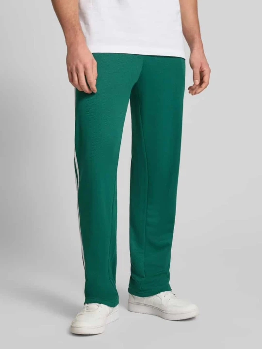 Zdjęcie produktu Spodnie dresowe z elastycznym pasem adidas Originals Zielony