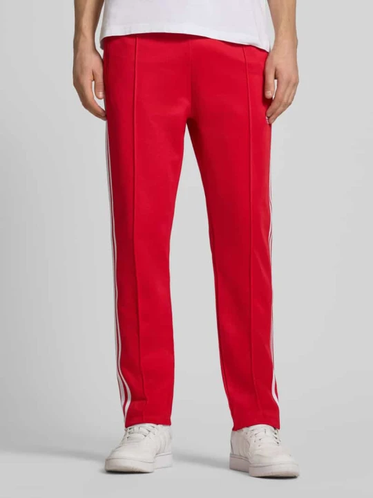 Zdjęcie produktu Spodnie dresowe z elastycznym pasem adidas Originals Czerwony