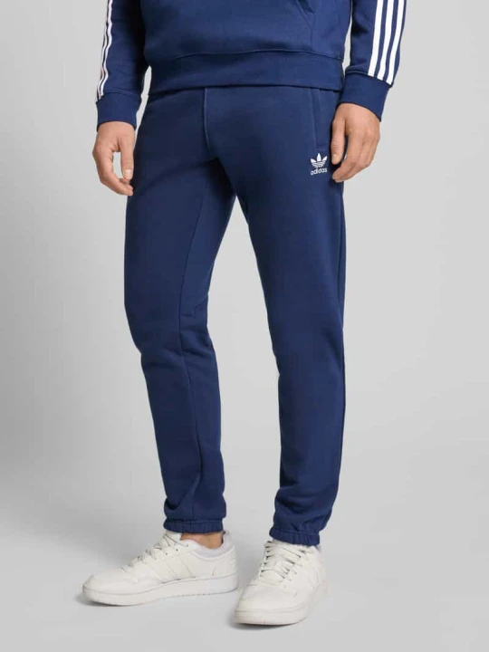 Zdjęcie produktu Spodnie dresowe z elastycznym pasem adidas Originals Granatowy