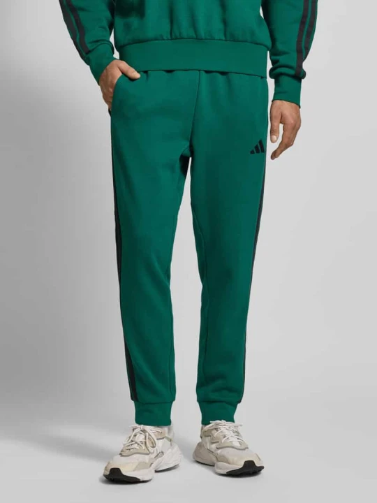 Zdjęcie produktu spodnie dresowe z elastycznym pasem Adidas Zielony