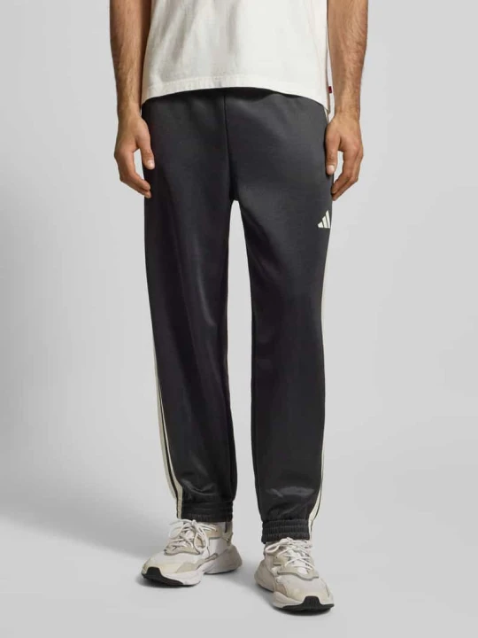 Zdjęcie produktu spodnie dresowe z elastycznym pasem Adidas Czarny