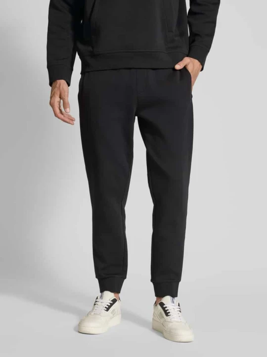 Zdjęcie produktu Spodnie dresowe z elastycznym ściągaczem Armani Exchange Czarny