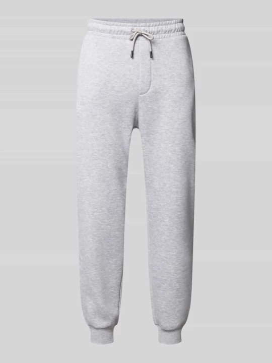 Zdjęcie produktu Spodnie dresowe z kieszenią z tyłu model ‘GORDON JJBRADLEY’ Jack&Jones Jasnoszary melanż
