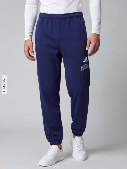 Zdjęcie produktu Spodnie dresowe z nadrukiem z logo Adidas Ciemnoniebieski