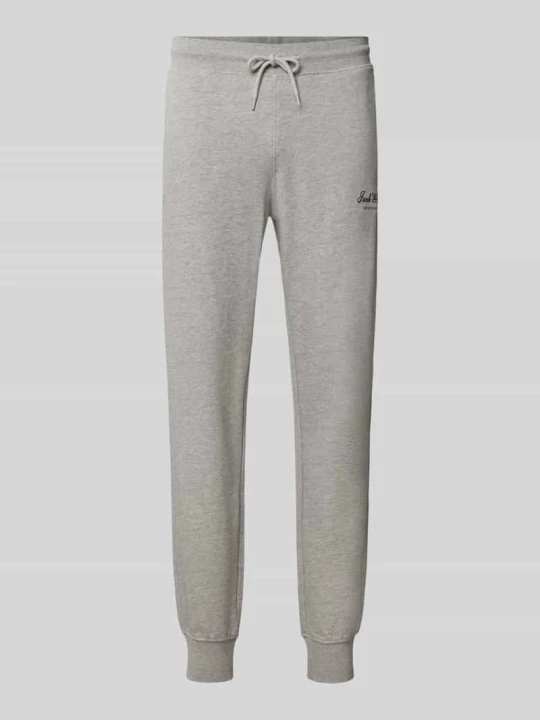 Zdjęcie produktu Spodnie dresowe z nadrukiem z logo model 'GORDON' Jack&Jones Jasnoszary melanż