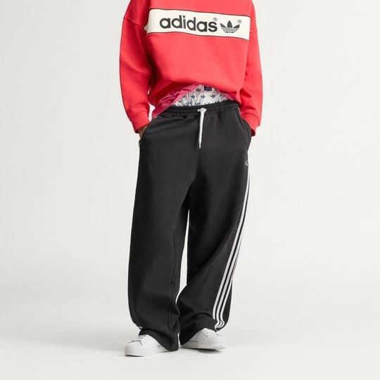 Zdjęcie produktu Spodnie dresowe z nogawkami bez ściągaczy i 3 paskami adiSignature Adidas