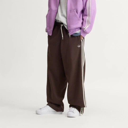 Zdjęcie produktu Spodnie dresowe z nogawkami bez ściągaczy i 3 paskami adiSignature Adidas beżowy