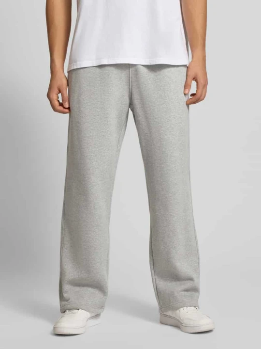 Zdjęcie produktu Spodnie dresowe z wyhaftowanym logo i elastycznym pasem adidas Originals Jasnoszary melanż