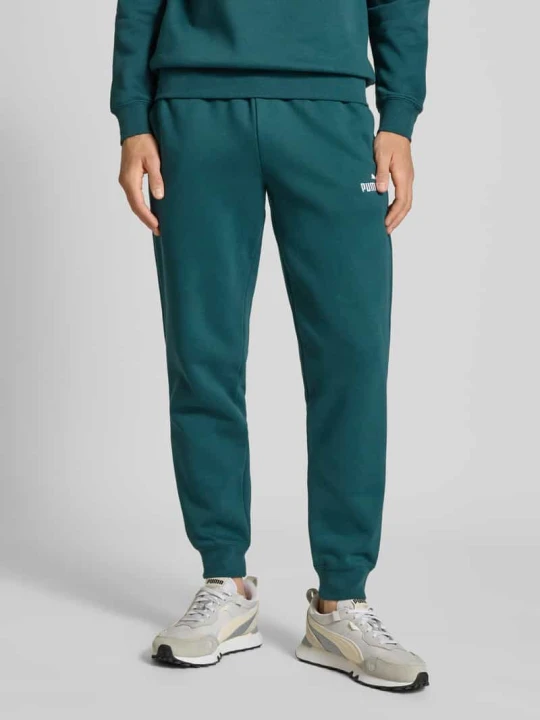 Zdjęcie produktu Spodnie dresowe z wyhaftowanym logo i elastycznym pasem Puma Butelkowy zielony