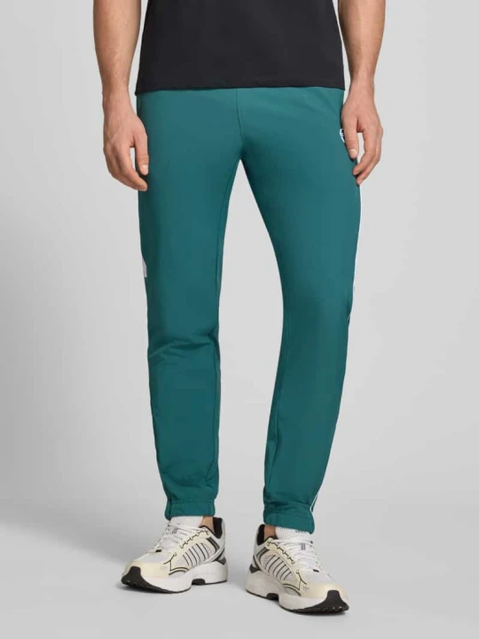Zdjęcie produktu Spodnie dresowe z wyhaftowanym logo model 'CASPIO' Sergio Tacchini Petrol