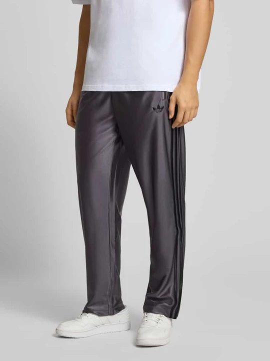 Zdjęcie produktu Jogpants z Wyhaftowane logo Model 'FIREBIRD' adidas Originals Antracytowy