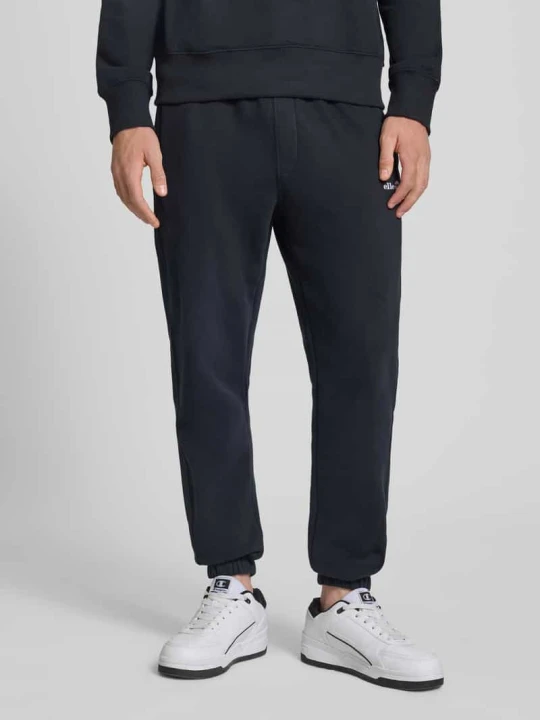 Zdjęcie produktu Spodnie dresowe z wyhaftowanym logo model 'ORVINIO' Ellesse Czarny